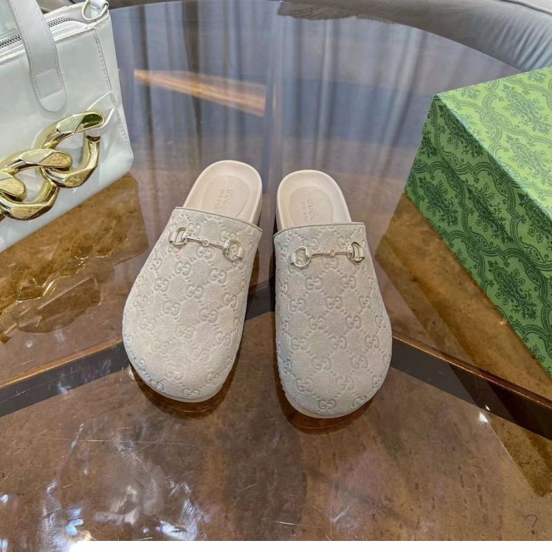G*u*i slippers